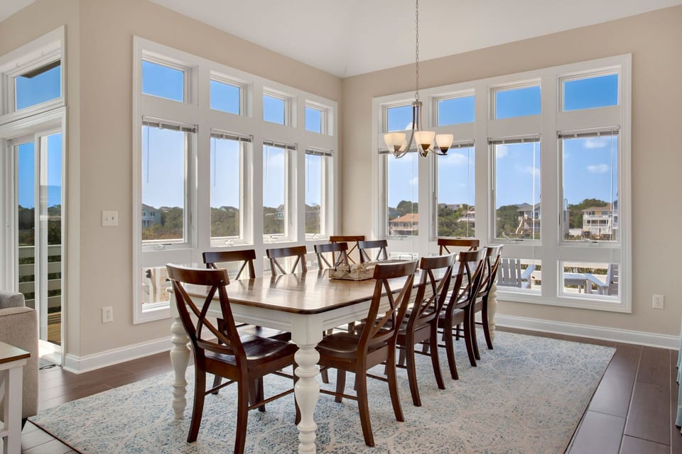 Eat together in the Top-Level Dining Area with Seating for 10.