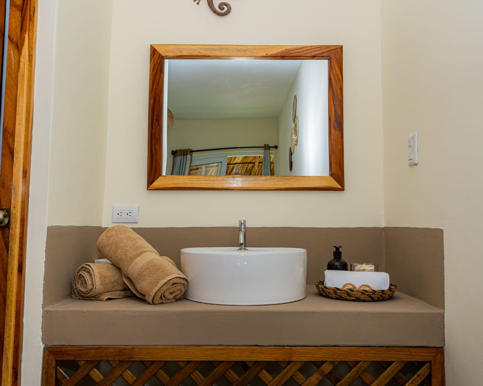 Standard Room, 2 Queen Beds | Bathroom | Shower, rainfall showerhead, towels, soap