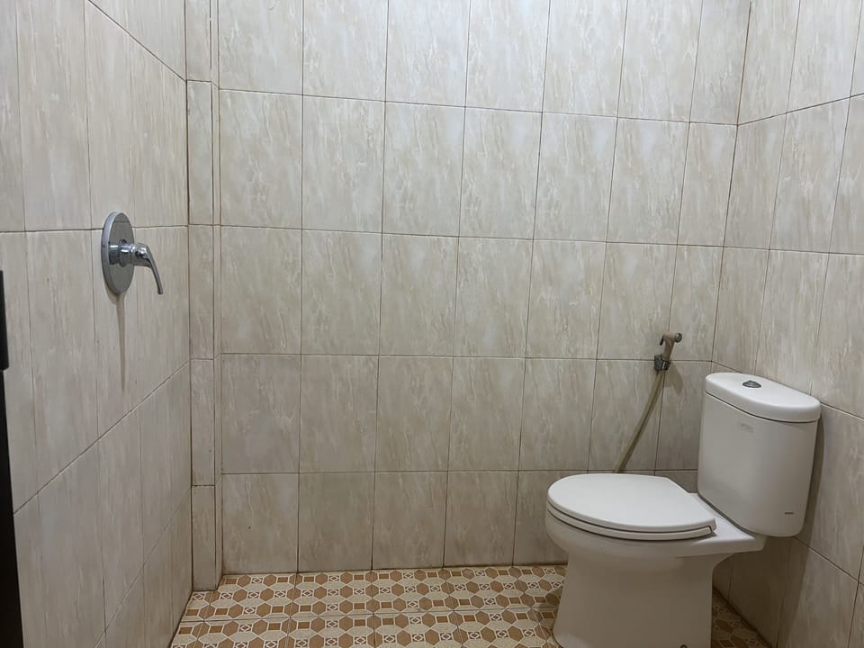 Basic Double Room | Bathroom | Shower, towels, soap