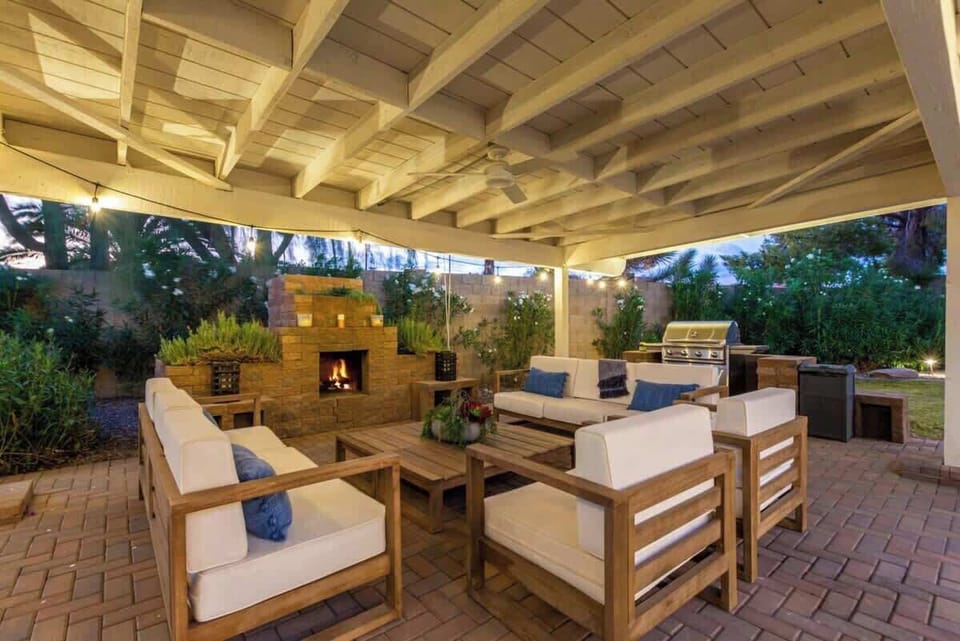 Cozy up in the private ramada with plenty of seating + BBQ