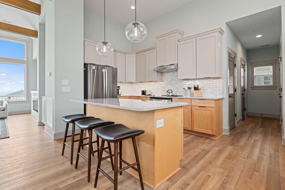 Kitchen with Bar Stool Seating on Third Floor