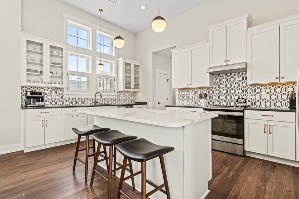 Kitchen with Bar Stool Seating on Third Level