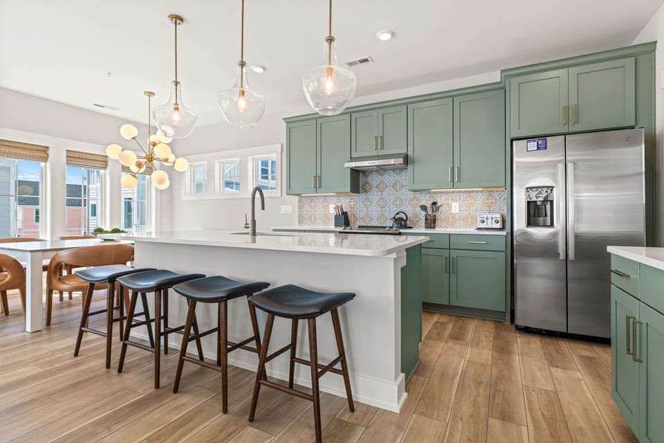 Kitchen with Bar Seating on Third Level