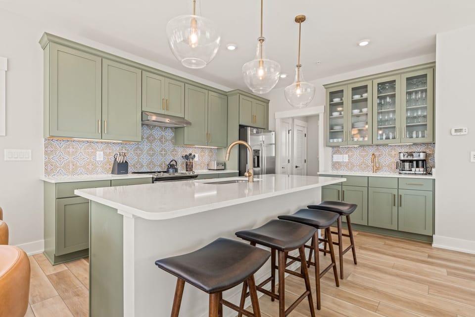 Kitchen with Bar Seating on Third Level