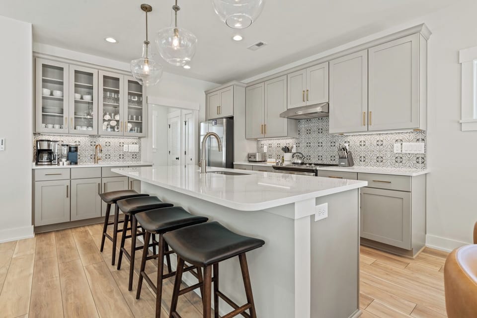 Kitchen with Bar Stool Seating on Third Level