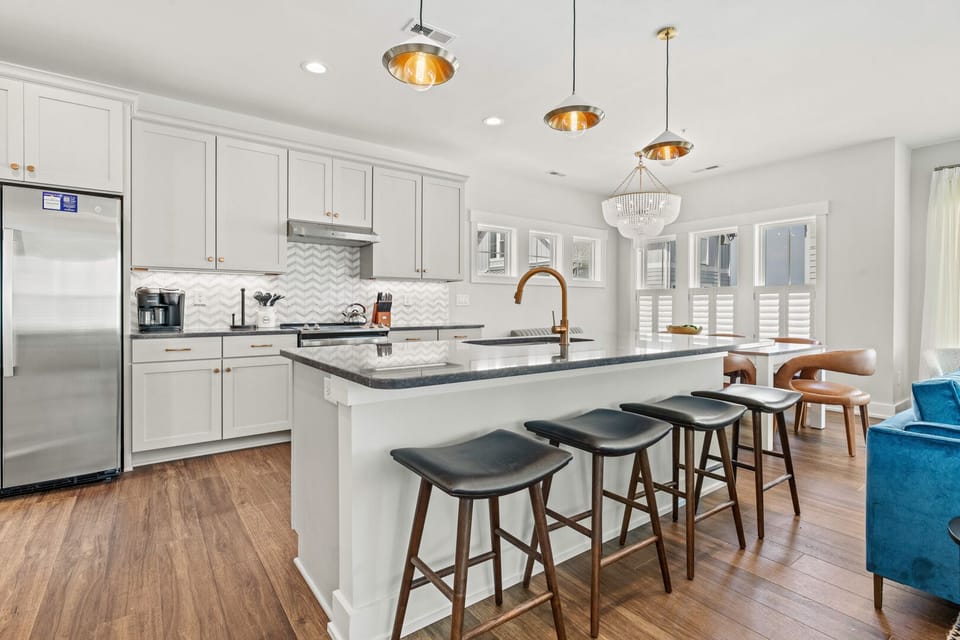 Kitchen with Bar Seating on Third Level