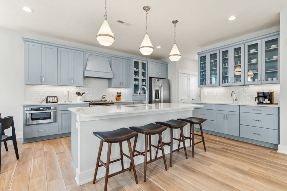 Kitchen with Bar Seating on Third Level