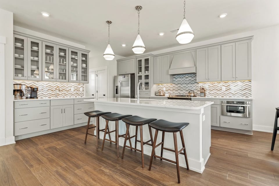 Kitchen with Bar Seating on Third Level