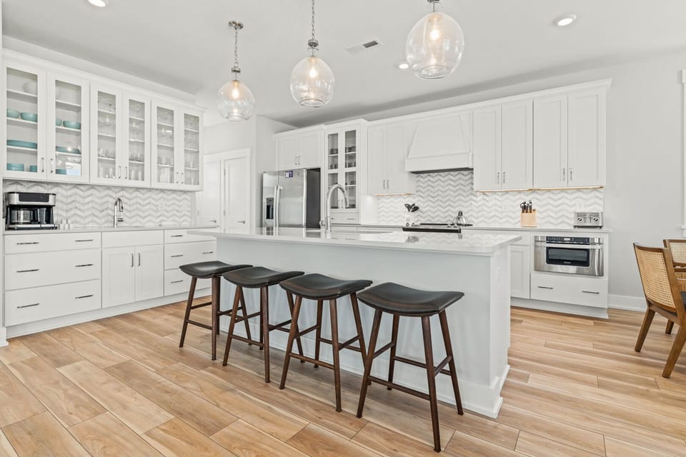 Kitchen with Bar Seating on Third Level