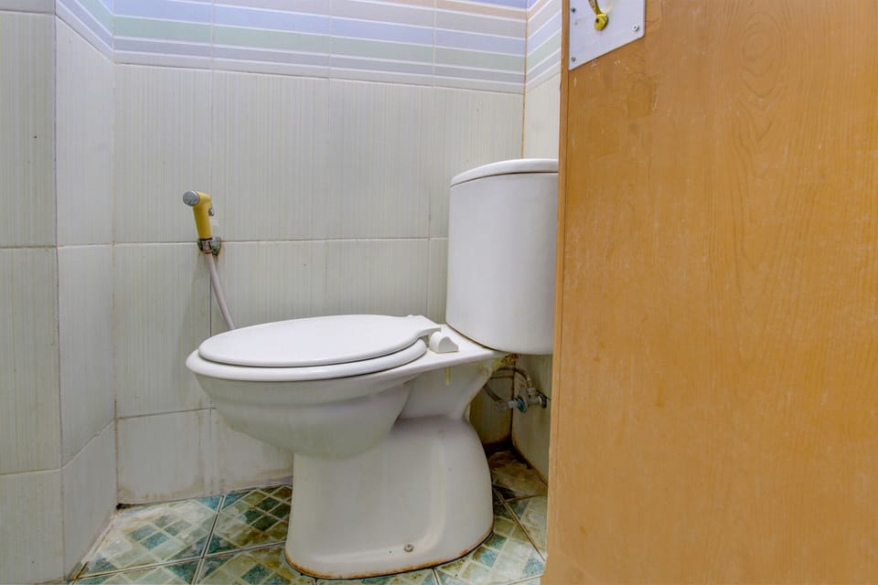 Economy Double Room | Bathroom | Shower, towels, soap