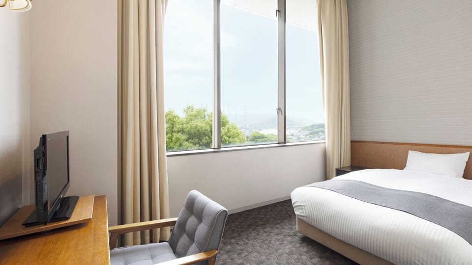 Economy Single Room(Lower Floor) ,Indoor Bath,Non-Smoking | In-room safe, bed sheets
