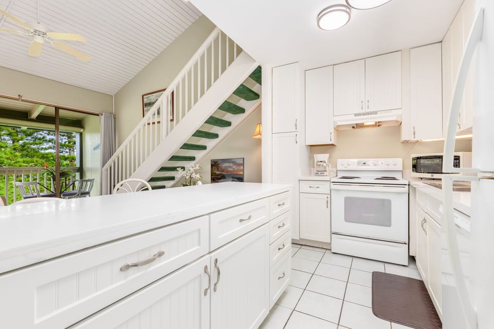A generously sized kitchen island at its heart, ready to cater to all your entertainment needs.