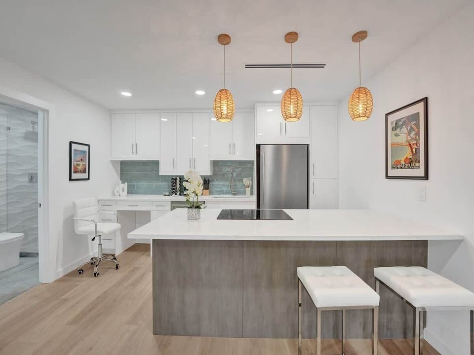 Kitchen is complete with kitchen wares and has brand new built-in designer appliances.