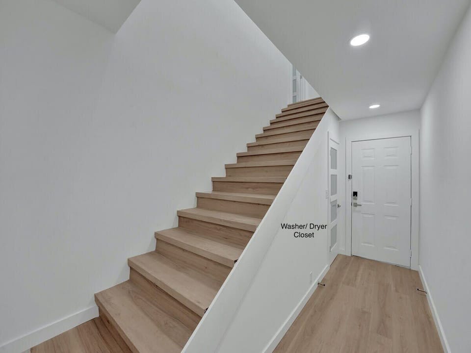 Entrance hallway to the villa.  Washer/Dryer closet is located at the bottom of the stairs.
