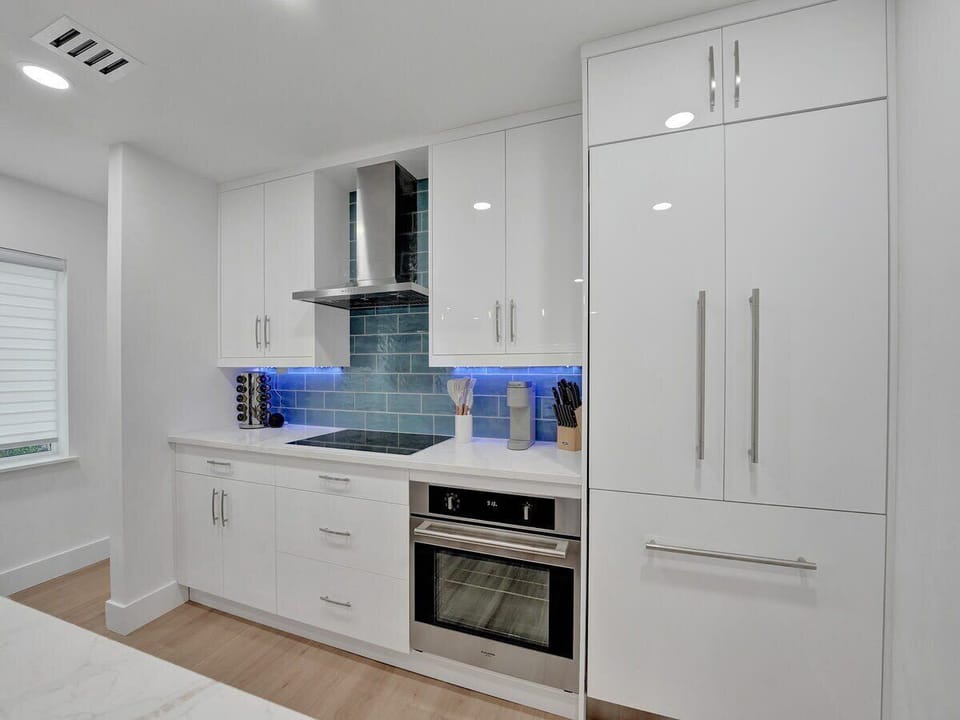 Kitchen is complete with kitchen wares and has brand new built-in designer appliances.