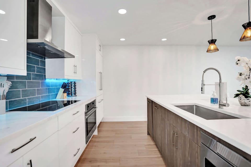 Kitchen is complete with kitchen wares and has brand new built-in designer appliances.
