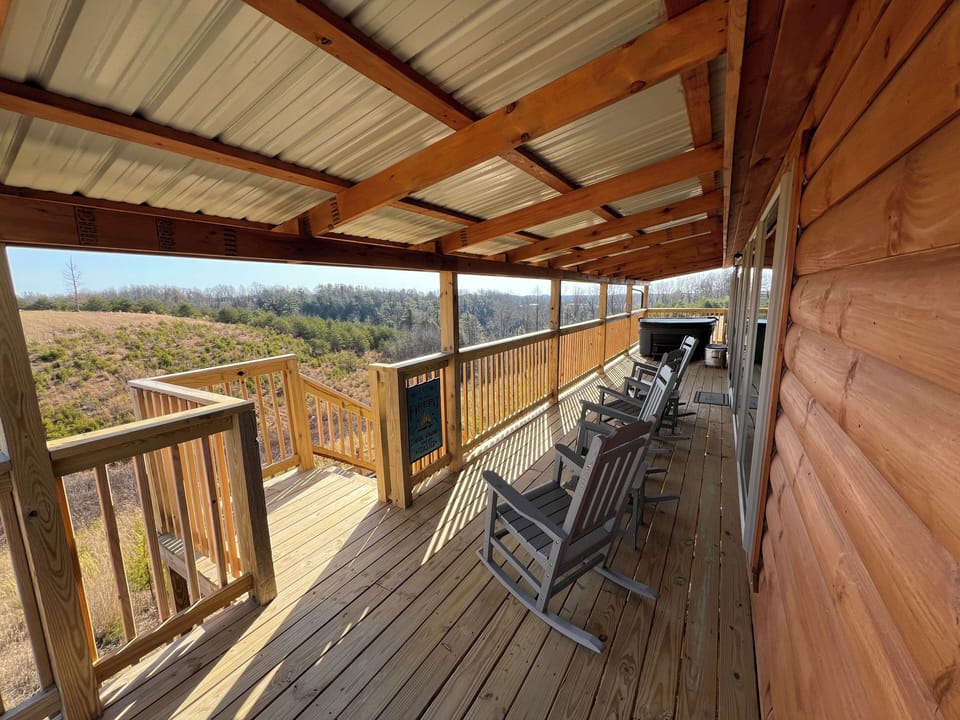 Covered porch and hot tub