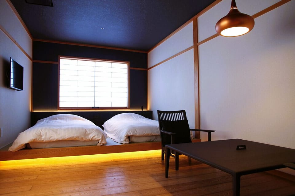 Twin Room | Down comforters, in-room safe, WiFi (free), individually decorated