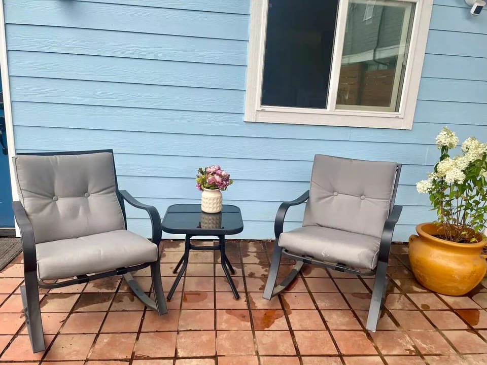 Outdoor seating with cushions.
