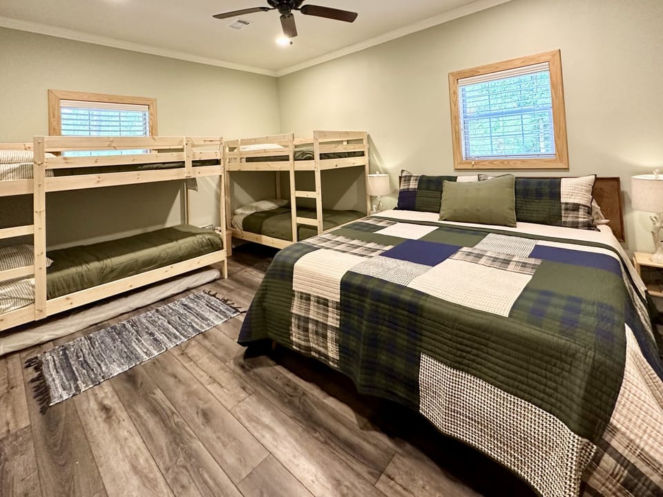 King size bed plus two twin bunks and trundle. Cots are also available.