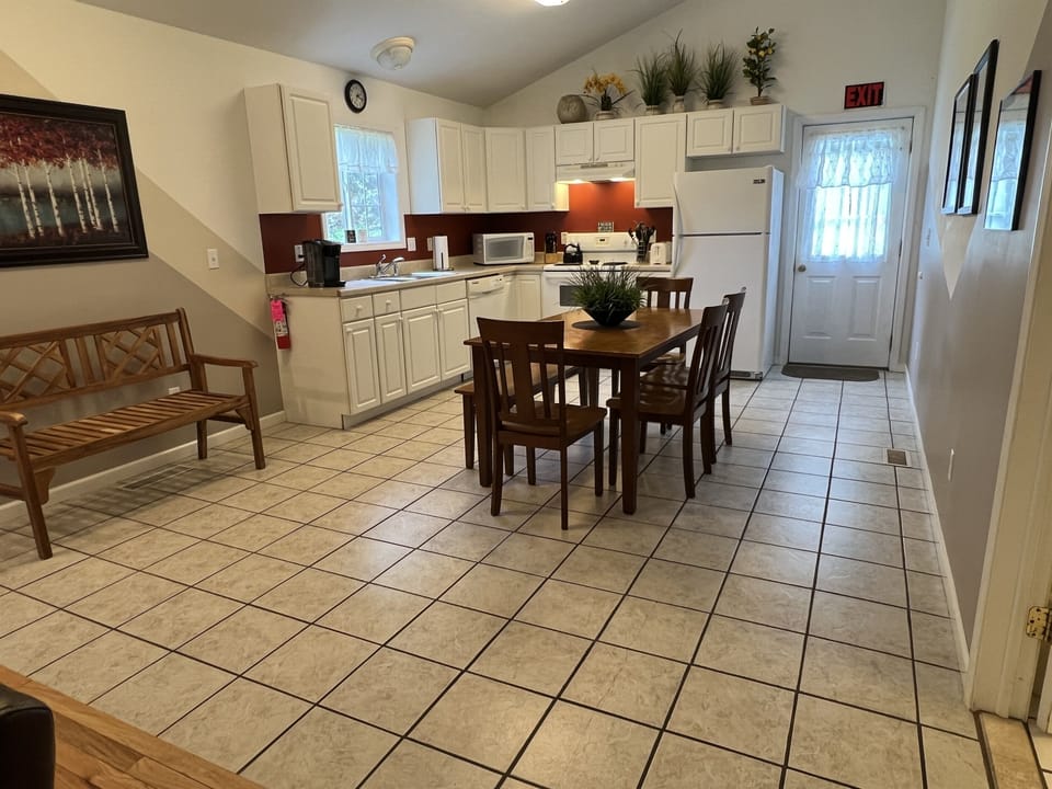 The Federal House Apartment 1 eat-in kitchen with plenty of space and everything you need to make a meal expect the food.