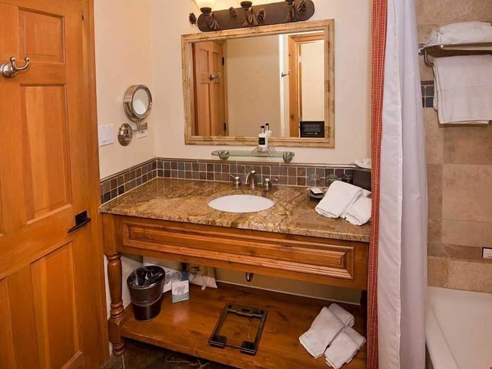 The bathroom comes equipped with bath amenities for your comfort and convenience.