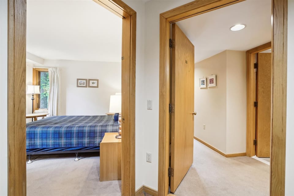 Looking into the queen sized bedroom.