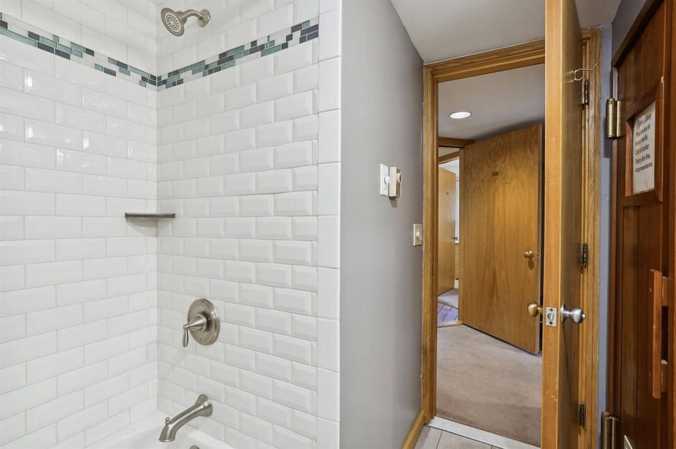 Full Bathroom - This full bathroom features a tub and shower combination for added convenience.