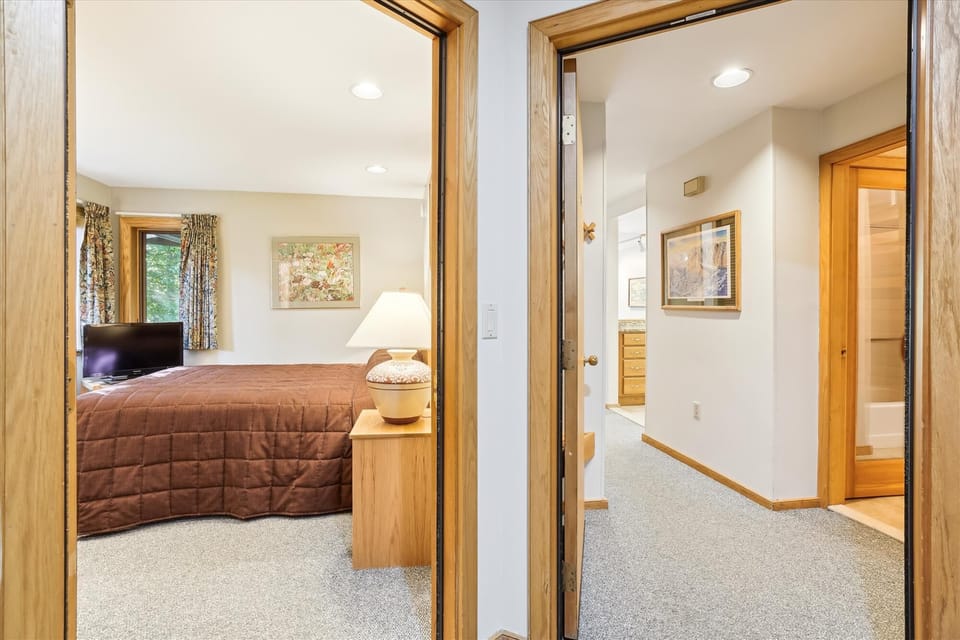 Looking into the bedroom and bathroom.