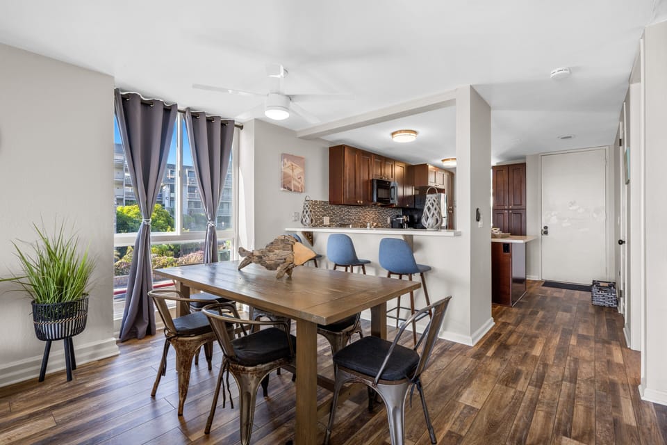 Gather together around the spacious dining table that comfortably seats 6 for family dinners or game nights.