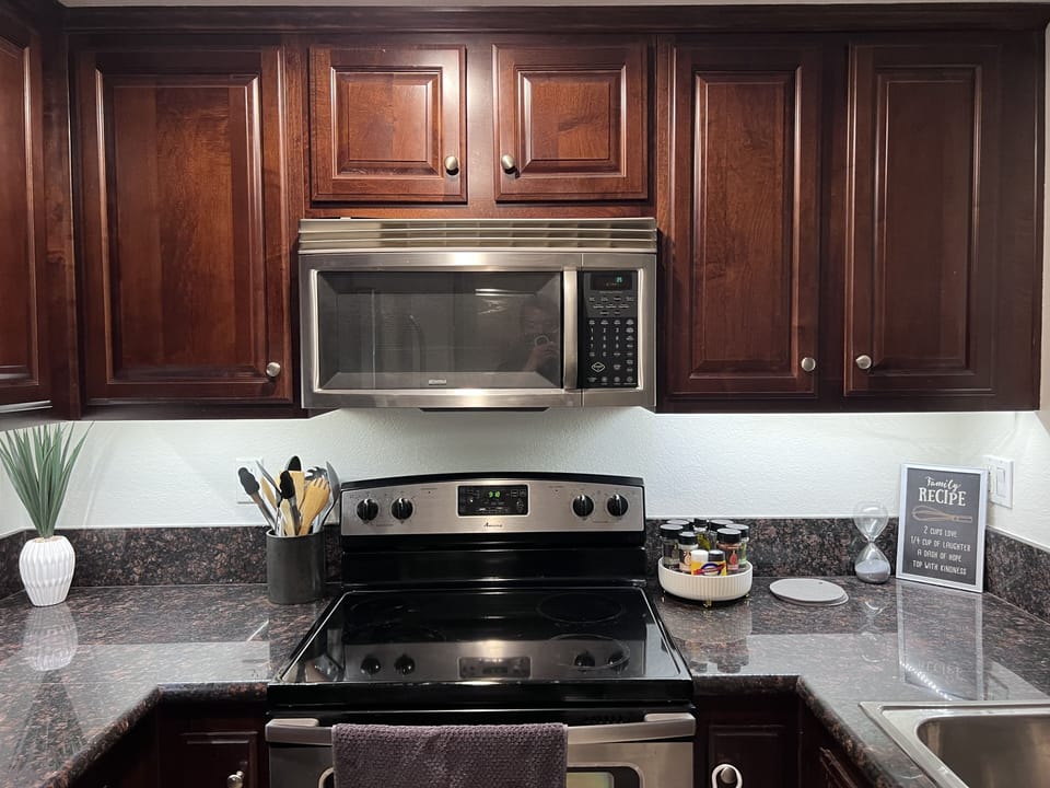 Kitchen comes with spices, dishware, pots and pan 