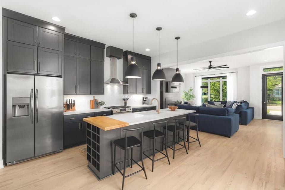 Fully-stocked, modern kitchen suitable for any chef! Seating for 4 at the kitchen island.
