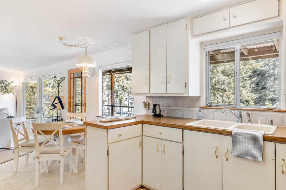 Simply inviting kitchen and dining.