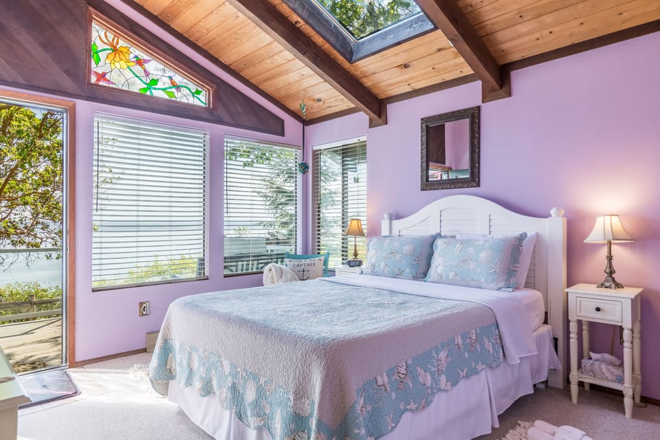 Bedroom 1 features a queen bed.