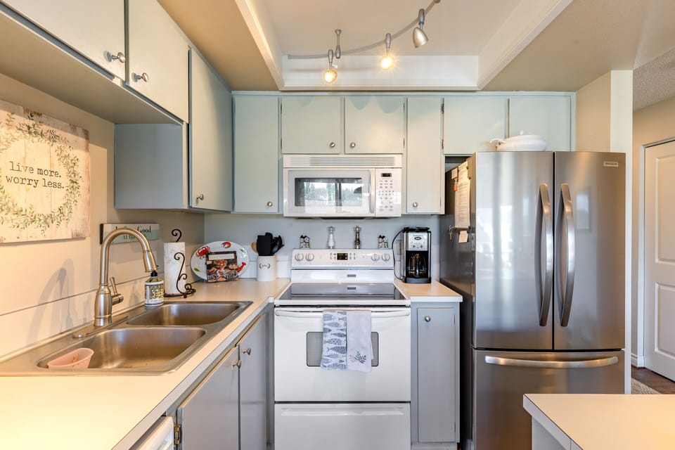 Modern and sleek appliances in this well-appointed kitchen.