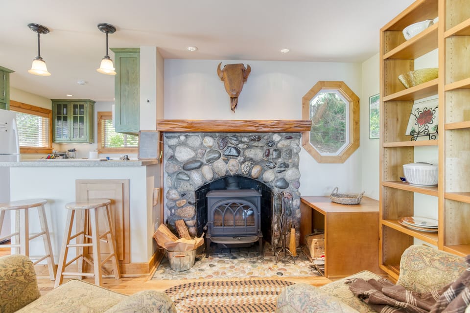 Cocooned in coziness, by the fireplace's glow.