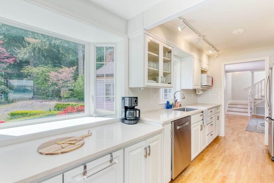 Sunlight streams in through the kitchen's south-facing windows.