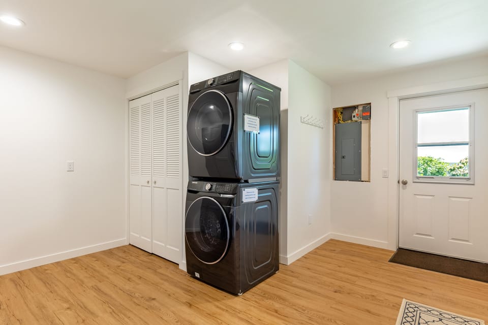 Washer and dryer conveniently stacked for your use.