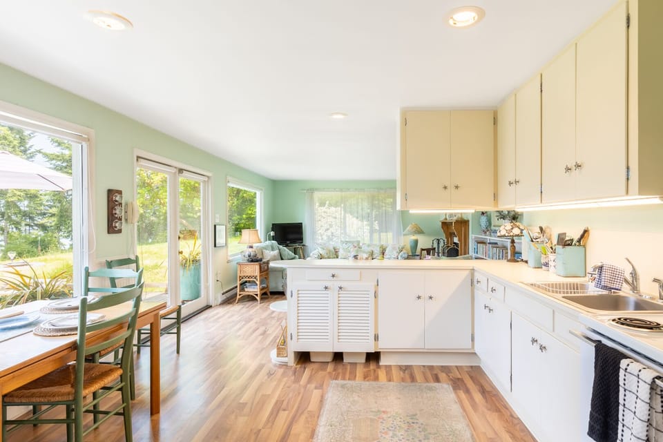 A bright and welcoming kitchen ready to host a delicious meal.