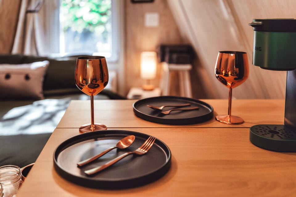 Imagine pouring drinks, setting plates, and settling into an intimate dinner after a day of hiking