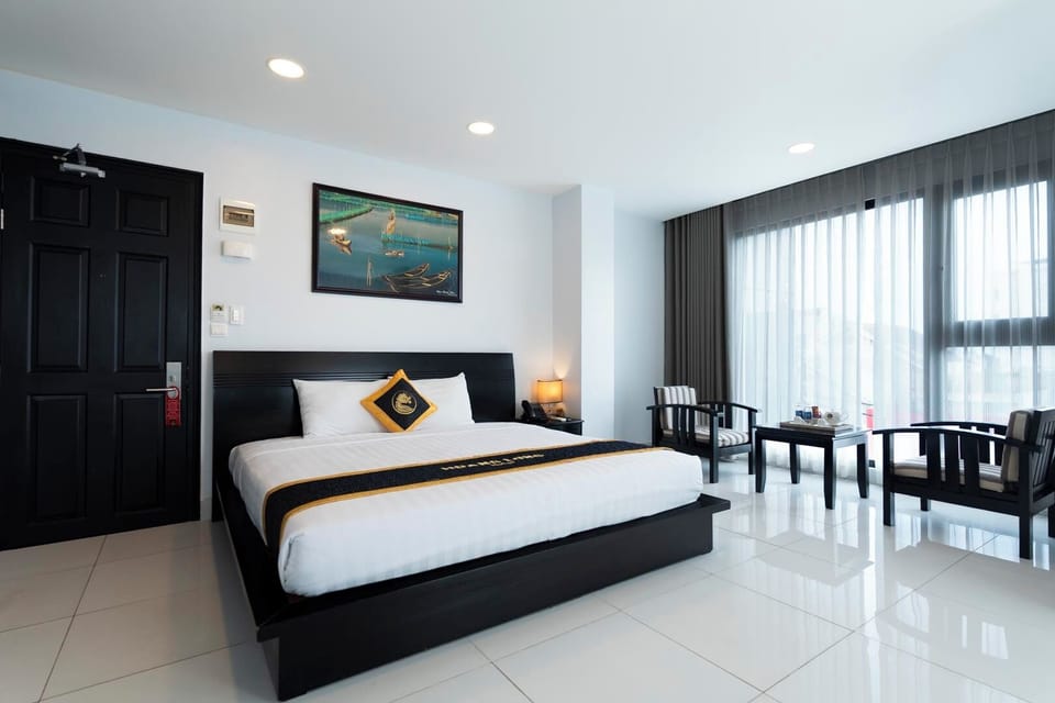 Deluxe Room, City View | Premium bedding, minibar, in-room safe, desk