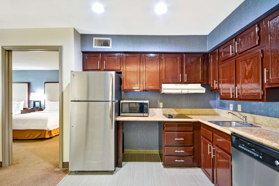 Suite, Accessible, Non Smoking | Private kitchen | Coffee/tea maker, full-size fridge, microwave, stovetop