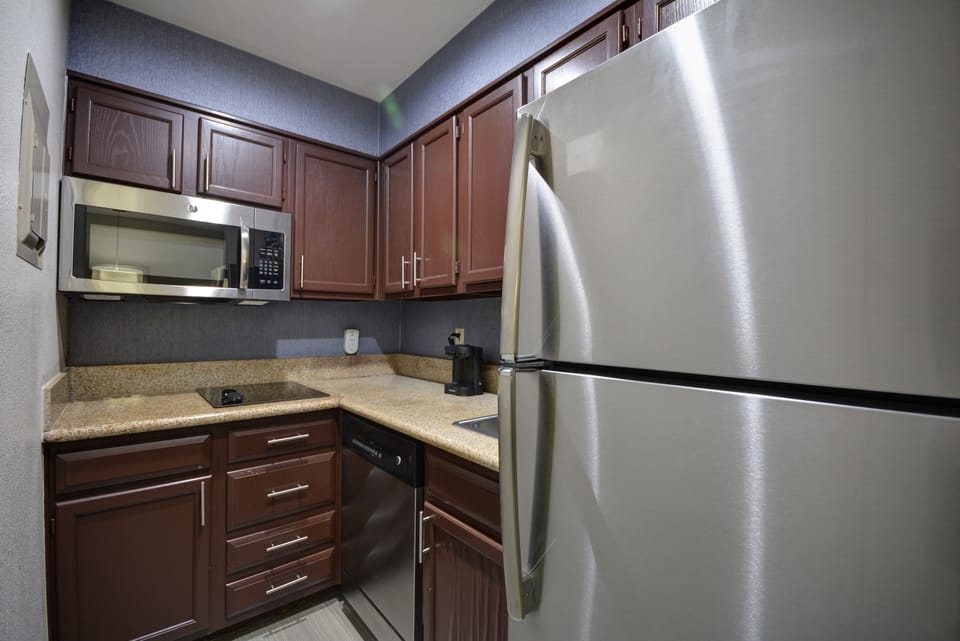 Two Bedroom Suite | Private kitchenette | Coffee/tea maker, full-size fridge, microwave, stovetop
