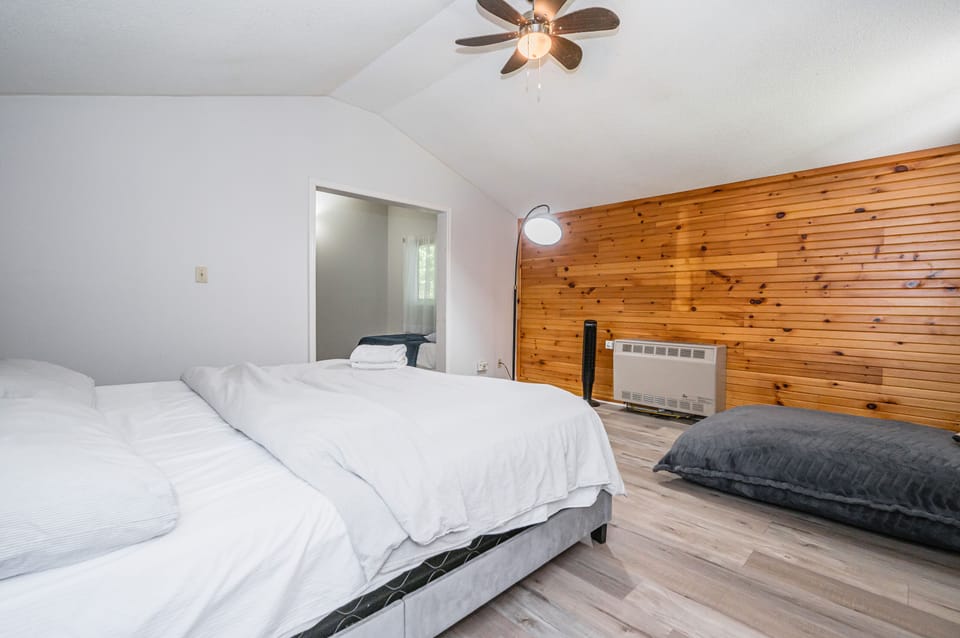 Bedroom 1: The primary suite with yoga bag. 
