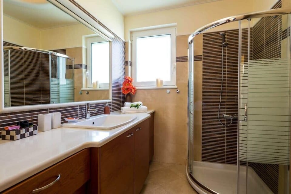 Well-Designed Bathroom Area with a Relaxing Shower