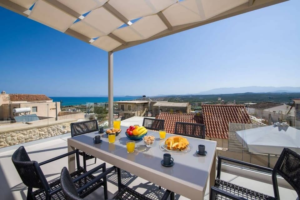 Savor Your Meals Outdoors at a Stylish, Shaded Dining Table