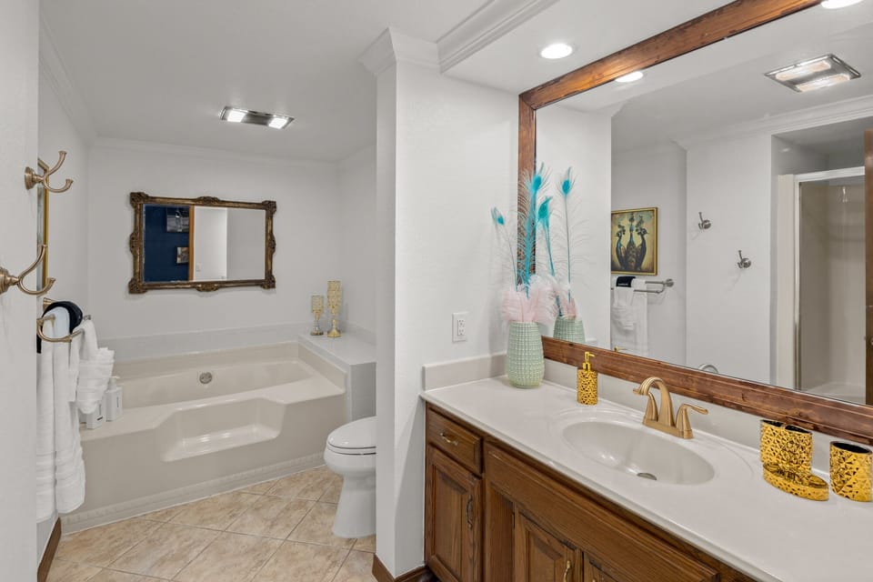 There's one more bathroom down the hall bringing our grand total to 3 bathrooms.  This guest bathroom includes a large clean soaking tub and separate shower.