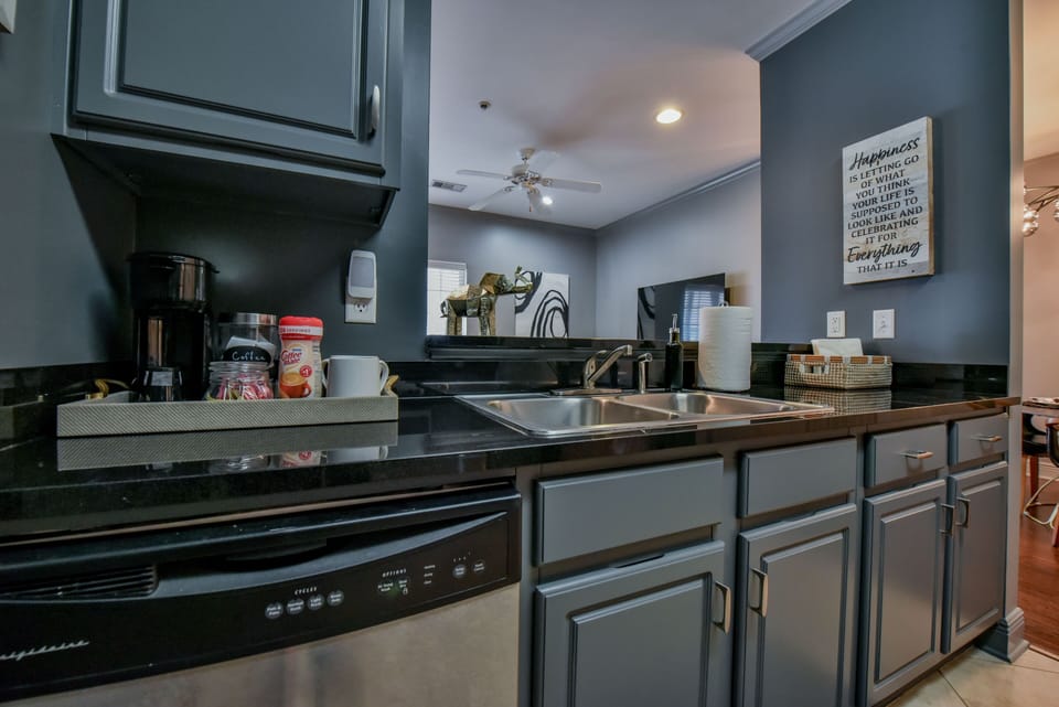 Kitchen - The kitchen also has a Keurig coffee machine and a starter set of coffee supplies.