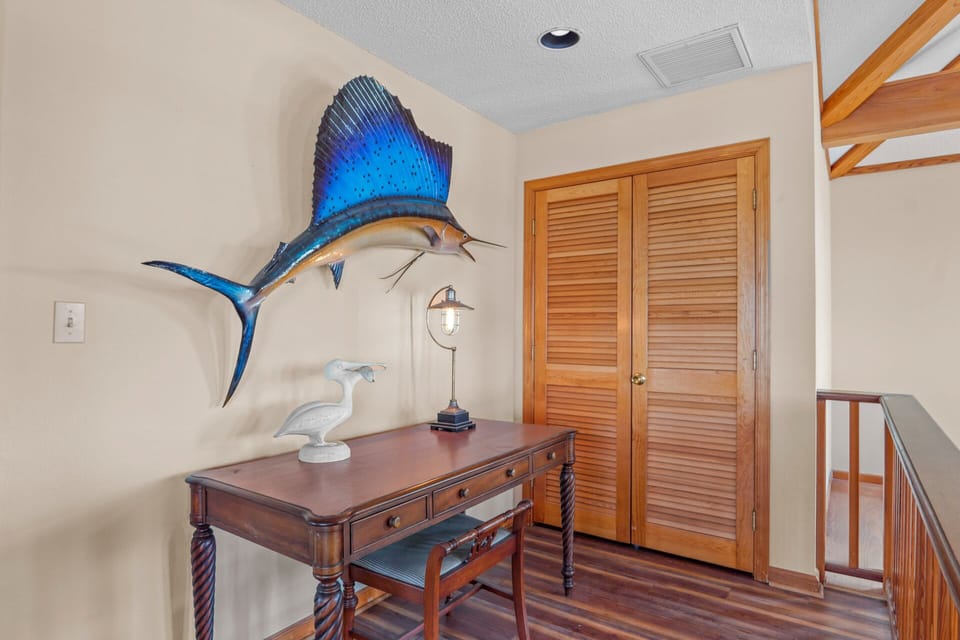 A work station is conveniently located right outside of the third level bedroom.