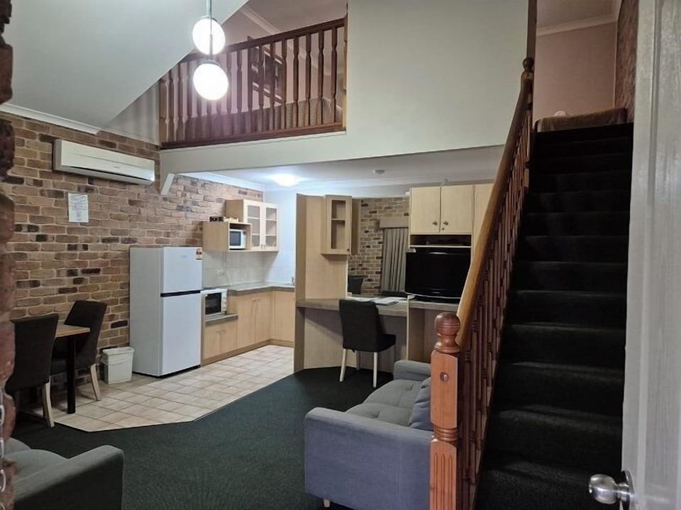 Family Room, Non Smoking, Kitchenette (Family loft Q4) | Living area | LCD TV, DVD player